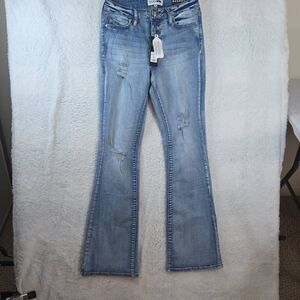 Fashion Nova Women's Stretch Ripped Flare Jeans Blue Denim Light Wash Size 3 NWT